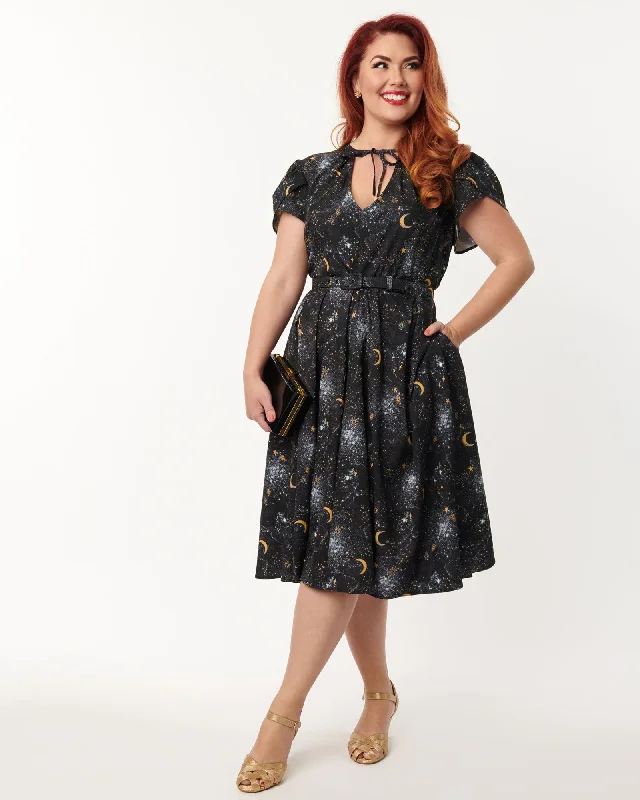Unique Vintage Navy Galaxy Print Dahlia Swing Dress | Blue