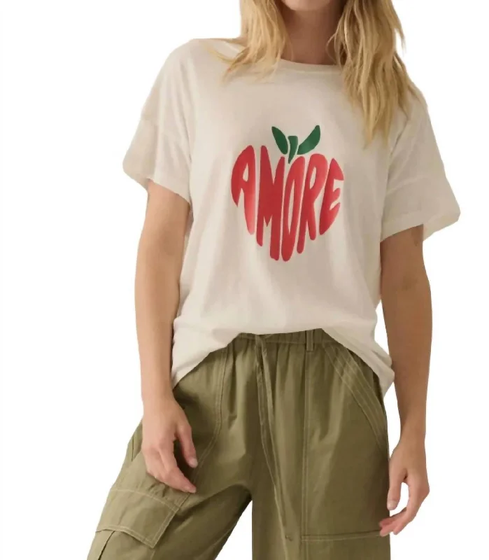 Amore Graphic Tee In Ivory Front Pockets Side Pockets Patch Pockets